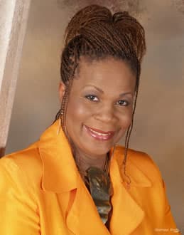 Portrait of JMOM founder Judy Mowatt